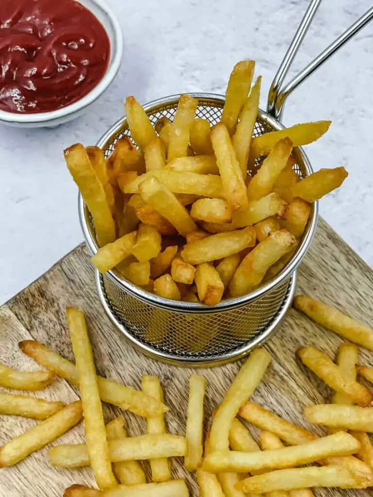Air Fryer Frozen French Fries in Rotating Basket